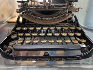 Photograph of an antique Corona portable typewriter