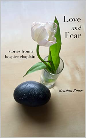 Book cover image, with a photo of a round black rock next to a small bud vase containing a single white flower with two leaves, on a plain beige table.